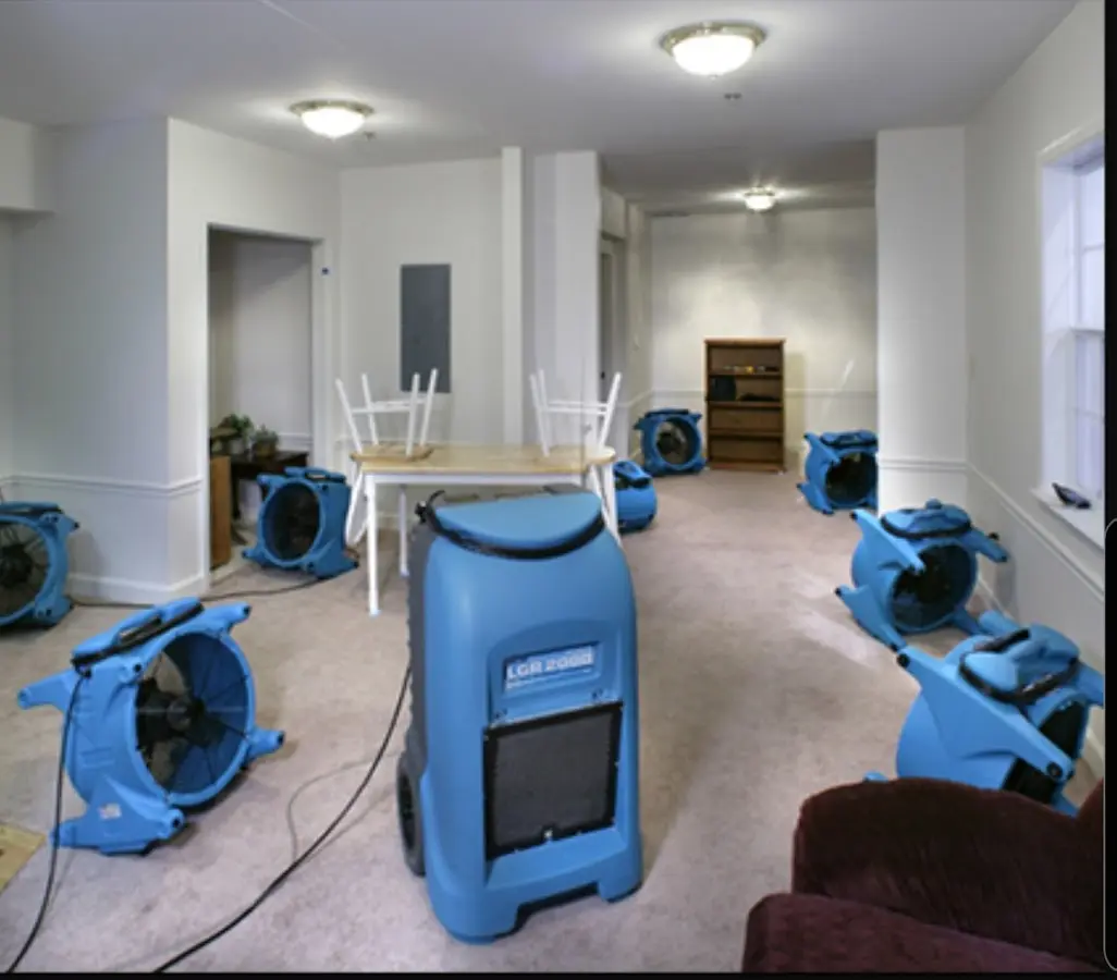 Air movers and dehumidifier setup for Water Damage Restoration in Tavares